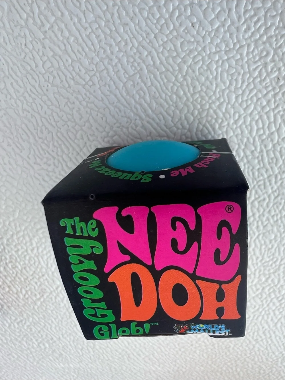 NeeDoh Mini’s groovy glob, ice baby, Dumpling and Mini Cheese Stress Toys